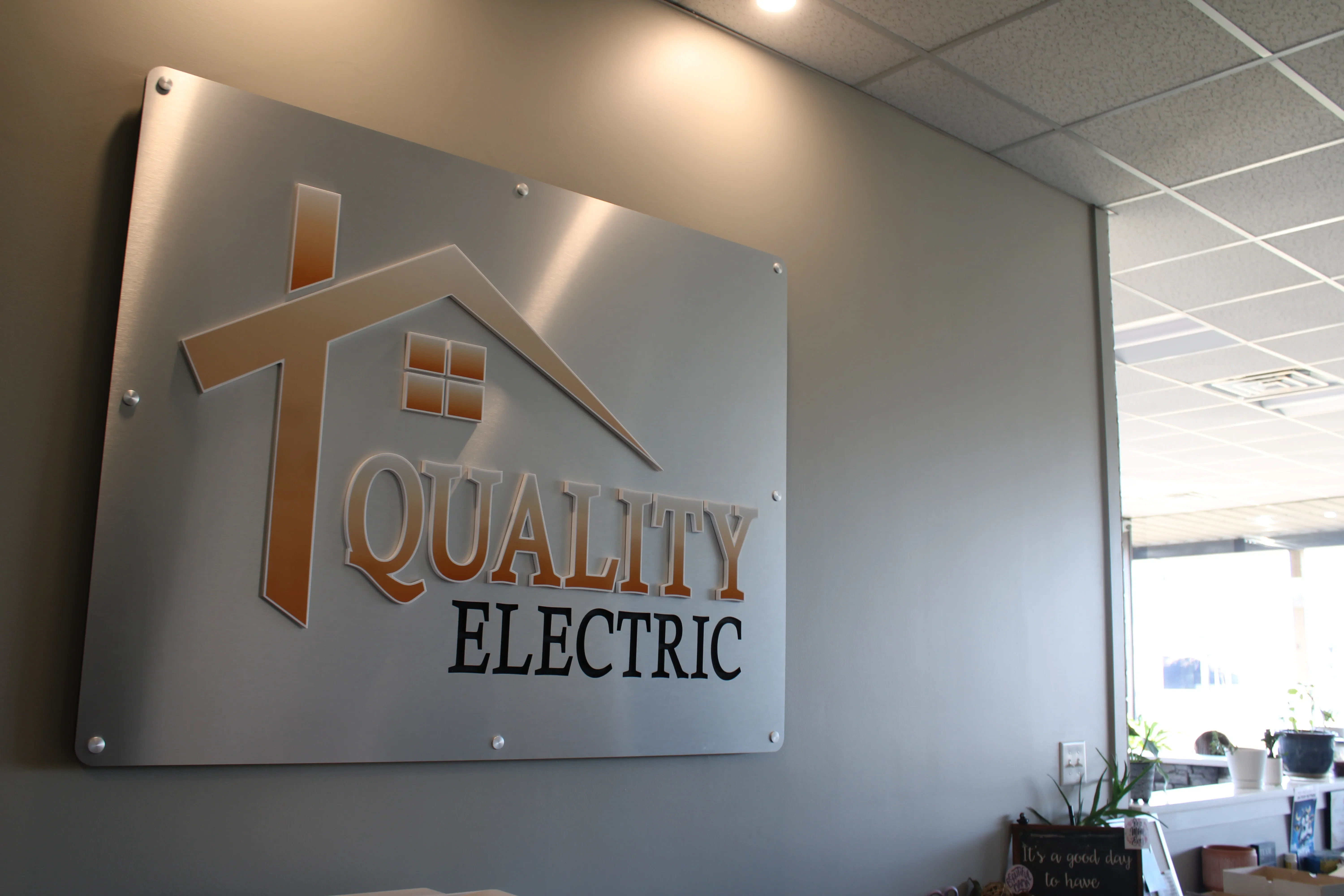 Quality Electric of Indiana LLC signage in the office on 3601 N Fruitridge Avenue